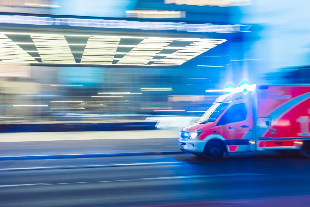 Ambulance driving fast in a state of emergency