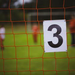 Red soccer net with number 3 label